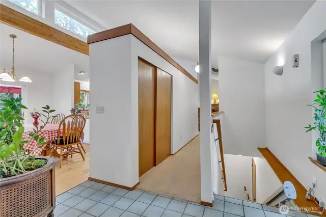 Stairs down lead to all the bedrooms.