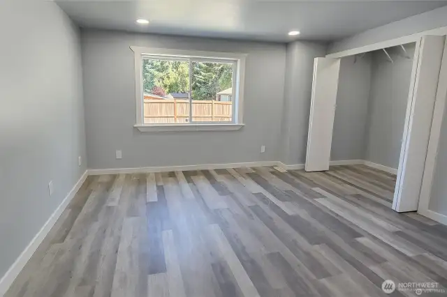 Primary bedroom with walk in closet