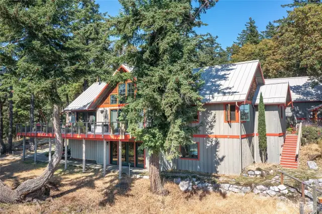 The west side of the home. Home has been recently painted, roofs cleaned and all system maintenance performed