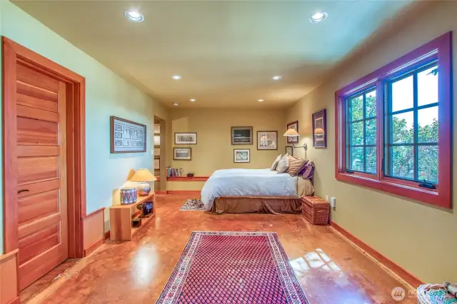 From the rec area on the lower floor looing toward the bedroom and stairs up to the main floor (on the left)
