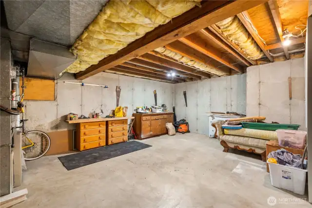 Partially finished lower level reveal the amazing quality of the construction and lumber used when this home was built.