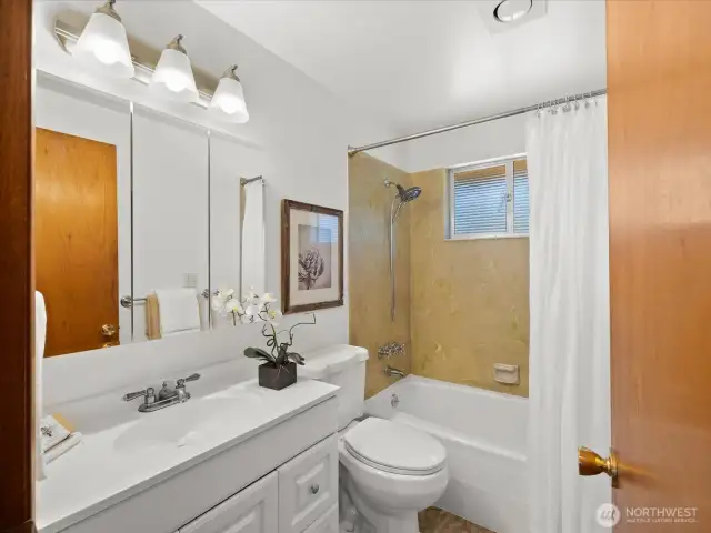 Full guest bath on main level.