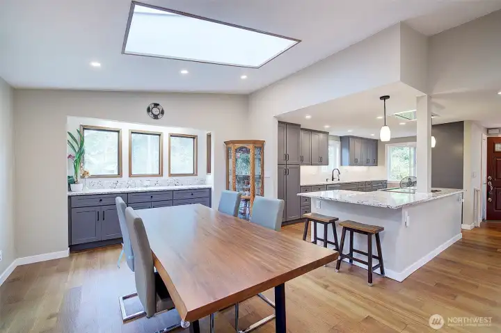 Counter and cabinets in the dining room would make a great coffee bar or serving area for dinners.