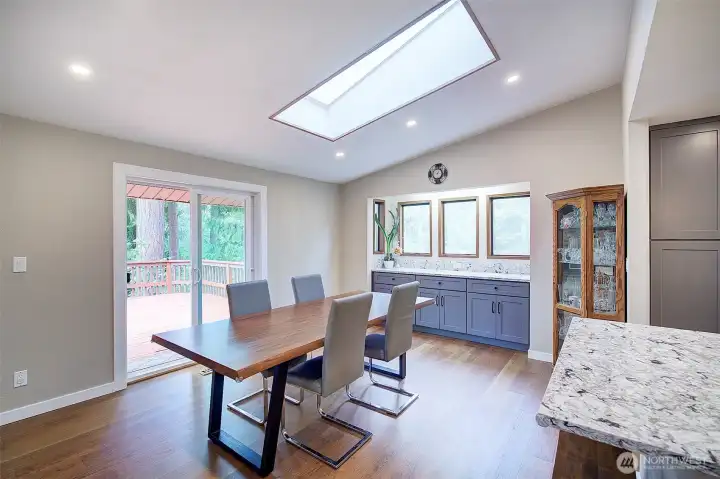 The slider off the dining room leads out onto a spacious deck that over looks the yard.