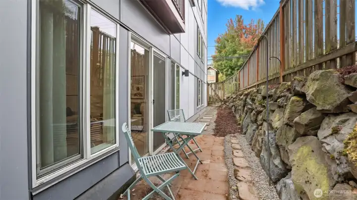 Your own private fenced-in backyard.  So perfect for fresh air, planting, pets.  Gate at the end opens up onto Greenwood Ave N.