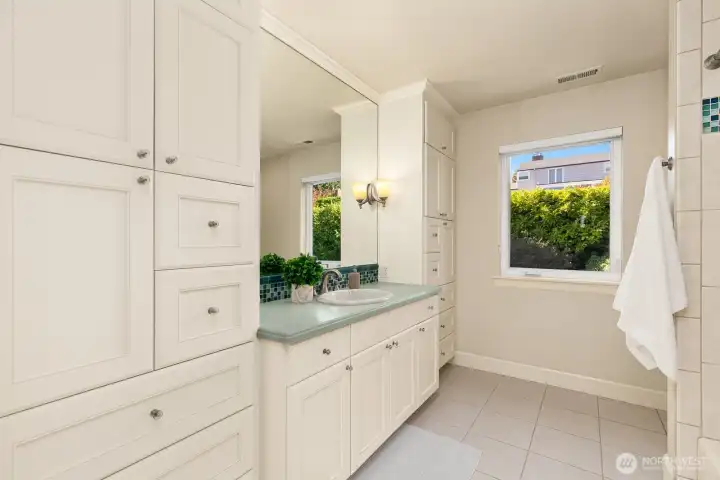 Upstairs guest bathroom.  Spacious with good storage cabinets.