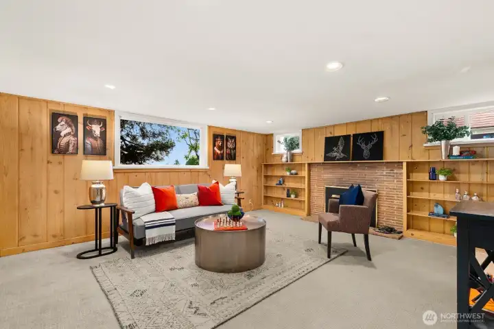 Now we venture downstairs to the rec-room.  Fun room with wood paneling and fireplace.