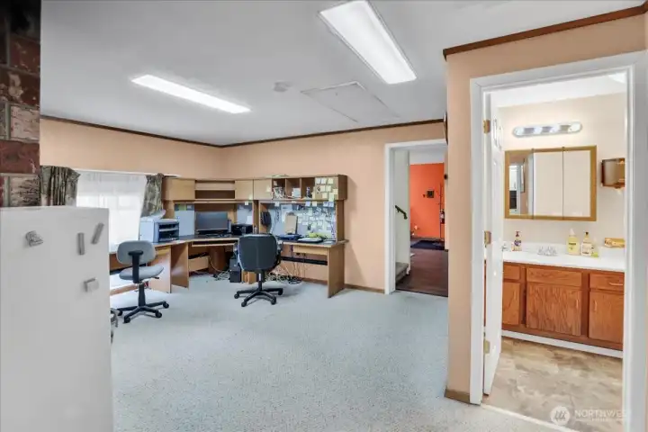 Den, bonus room and half bath.