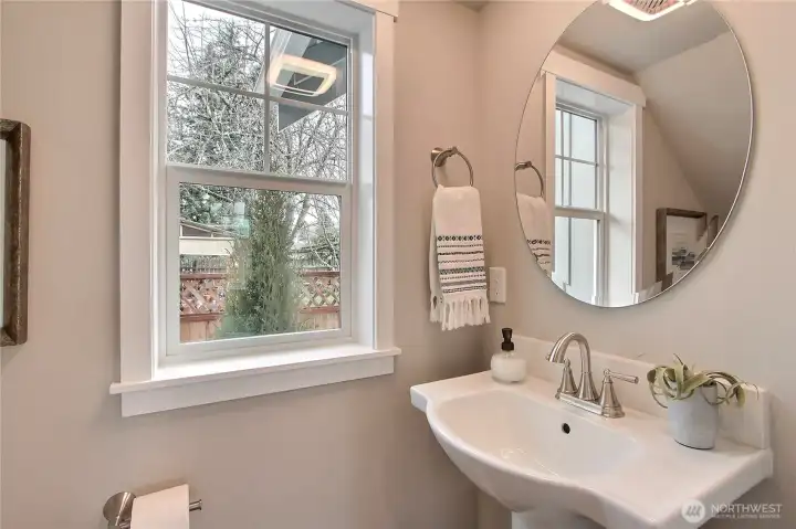 **Photos are of Unit B, for illustrative purposes only. Unit C has all the same finishes w/reversed floor plan.** First-floor powder bathroom.