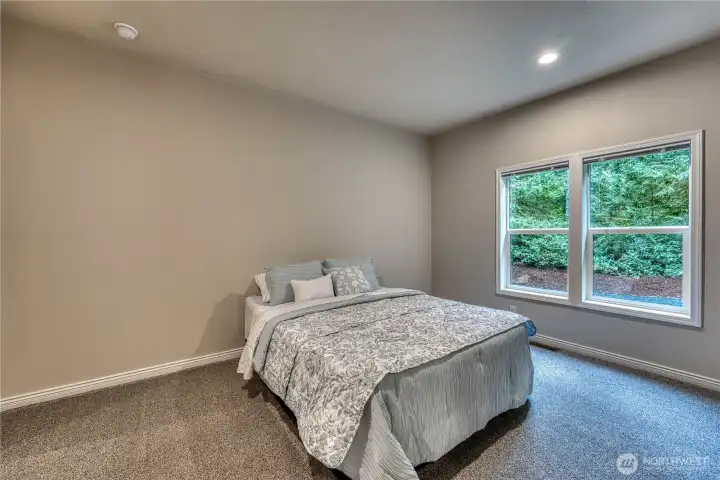 TO the right is a large walk in closet