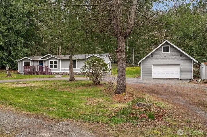 Set on over 1.22 mostly level acres, this Ravensdale home offers rare space and privacy. The expansive grounds create a peaceful retreat away from city congestion. No HOA restrictions!