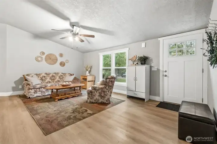 Step inside to clean LVP flooring that brings a fresh, modern feel to the main living areas. The durable surface is perfect for busy households. It sets the tone for the home’s updated interior. The home enjoyed a full remodel in 2018. Recent interior paint ensure this home is move-in ready!