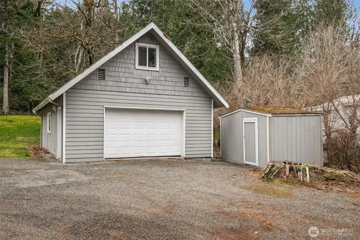 The detached shop/garage includes power and ample room for tools, vehicles, or equipment. It’s an ideal setup for hobbyists, mechanics, or anyone needing extra workspace. This structure expands the property’s functionality.