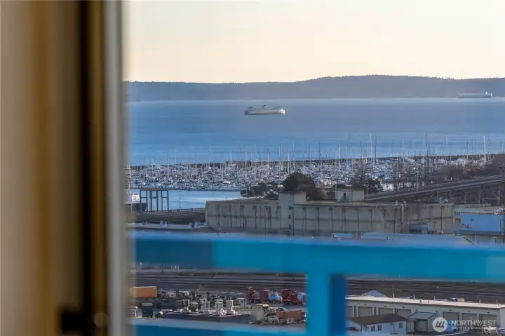 A living backdrop of ferry crossings and maritime activity, where the rhythm of the water is always in motion