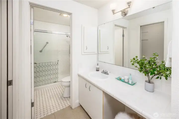 A well-appointed bath designed for ease, with clean lines and practical functionality