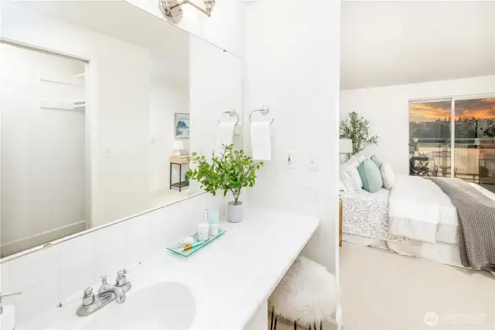 Even here, the view remains—present as you begin and end the day at the ensuite vanity