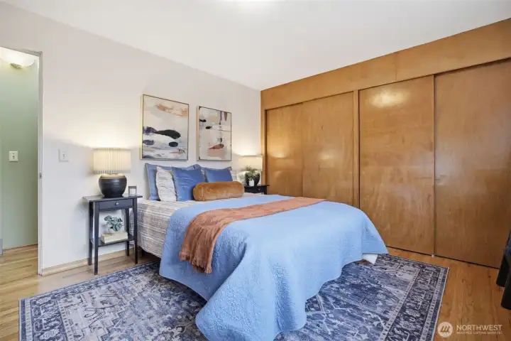 The primary bedroom is spacious and has 2 closets.