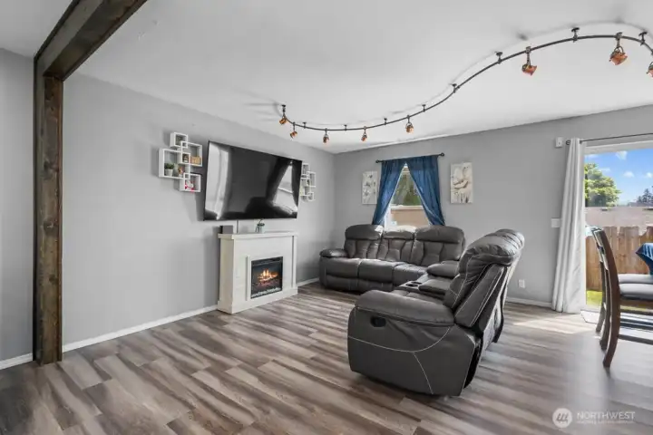 Open-concept Great Room seamlessly connects living and dining areas for easy entertaining.