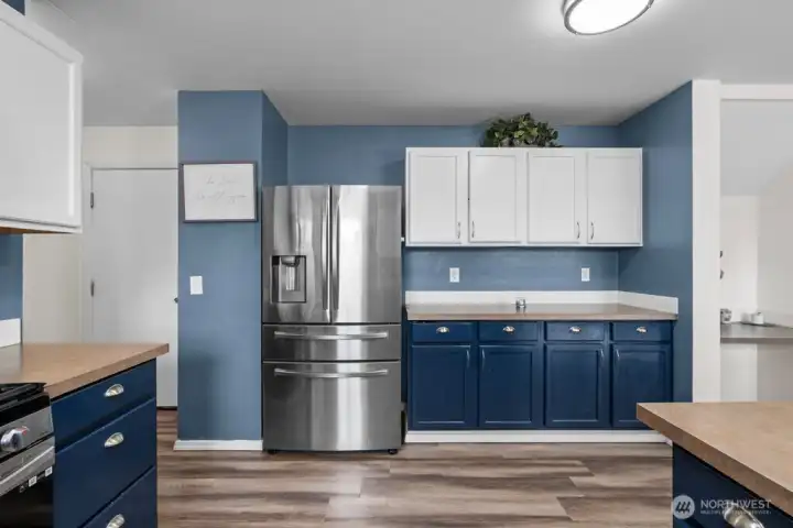 Spacious Kitchen Featuring An Abundance Of Cabinetry And Storage Space