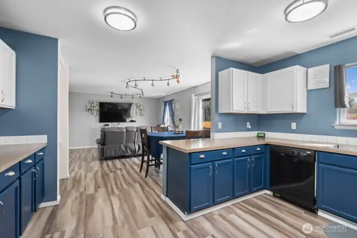 Spacious Kitchen with Seamless Flow to Dining and Living Areas