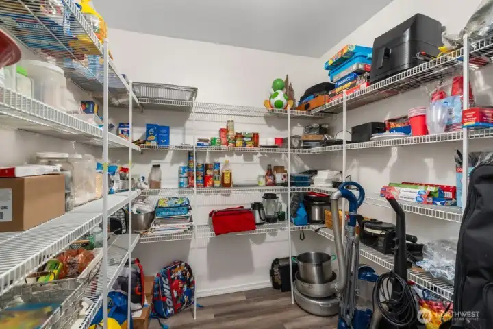 Over-Sized Pantry Conveniently Located Near The Garage Entrance For Easy Grocery Unloading