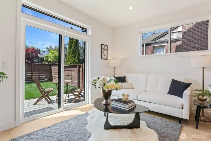Living room with sliding glass door to the yard Living room with sliding glass door to the yard