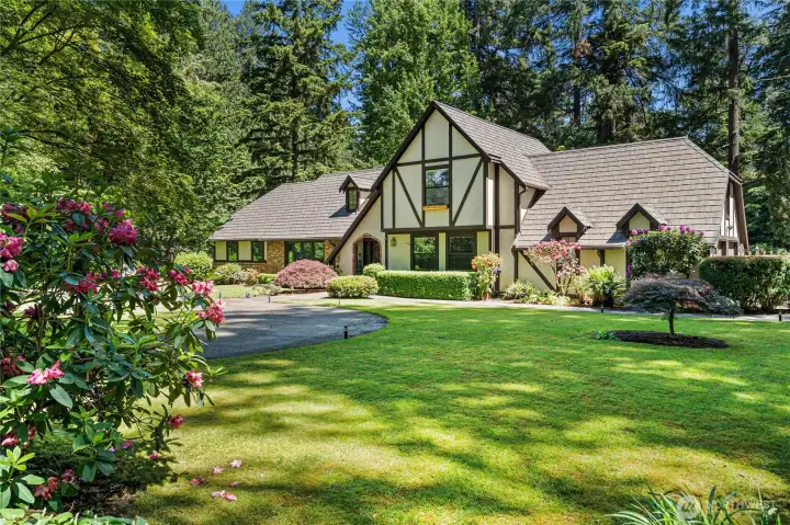 Meticulously maintained Tudor on more than 2/3 of an acre