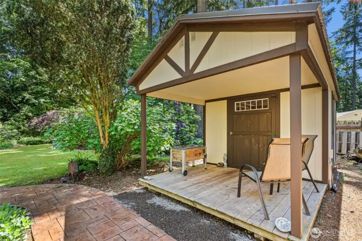 Utility shed with covered front porch