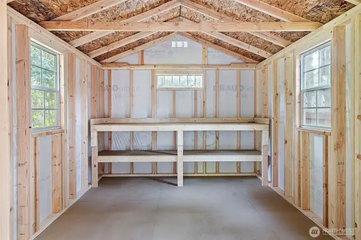 Utility shed with power could flex as shop, office or yoga space