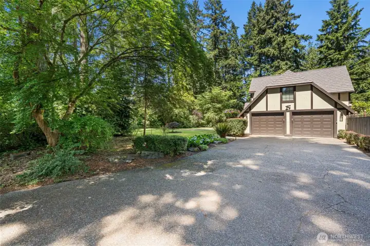 Attached two car garage with ample driveway parking