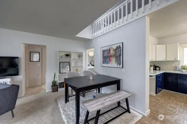 Dining area and kitchen. Notice the loft with extra sleeping room.