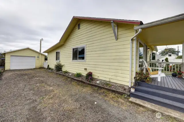 Front covered porch and entry, low maintenance cement board siding, detached garage and plenty of parking.