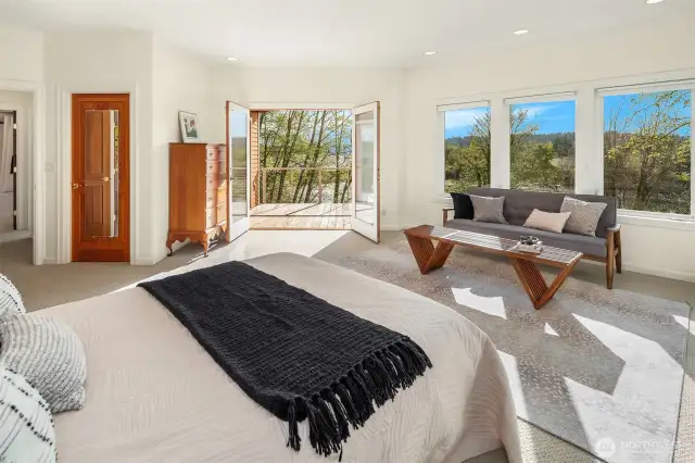 French doors open to the second level deck.