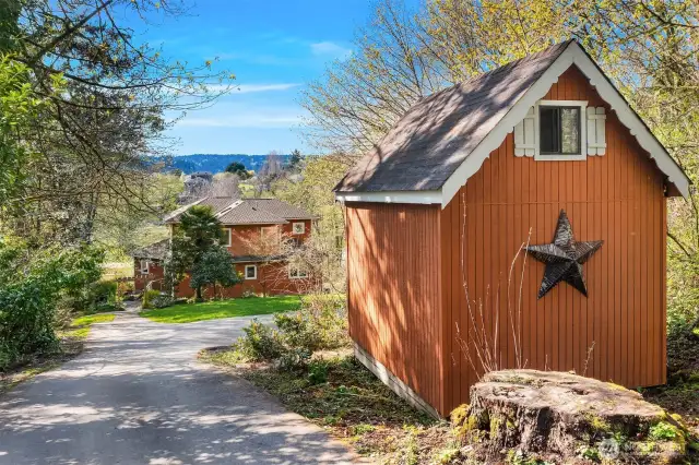 The main home and the studio look west.