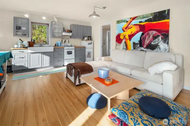 The basement apartment is as bright as the main level, with west facing windows to the  Lagoon.
