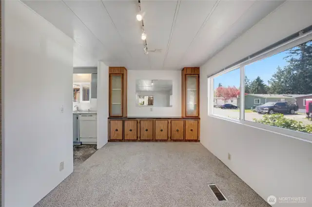 Plenty of space in the Dining Area with extra cabinets and counter top; room to entertain guests comfortably.