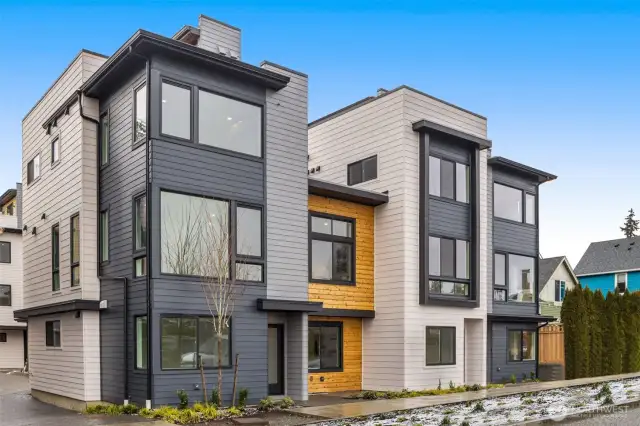 Welcome to Ivy North – a fresh take on Seattle living! Modern architecture, clean lines, and warm wood tones set the tone for this stylish new community right across from Crown Hill Park.