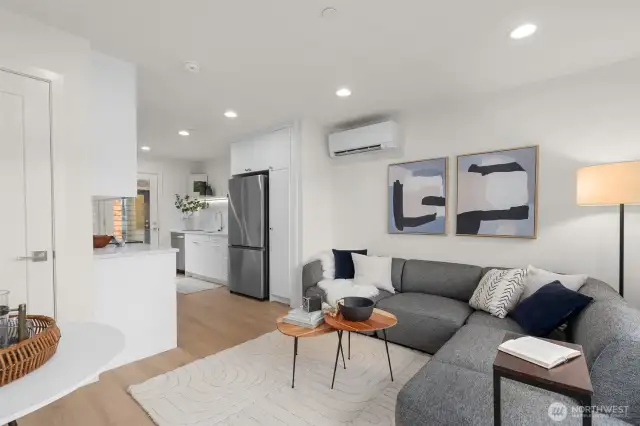 Bright, open, and made for living. This main floor layout blends kitchen, dining, and lounging easily—plus that corner sofa? Chef’s kiss.