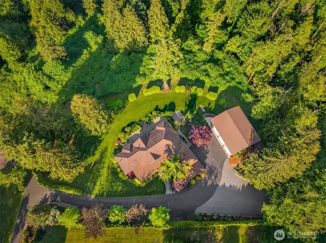 Check this 1.3 acre masterpiece out with 2000sq ft shop!