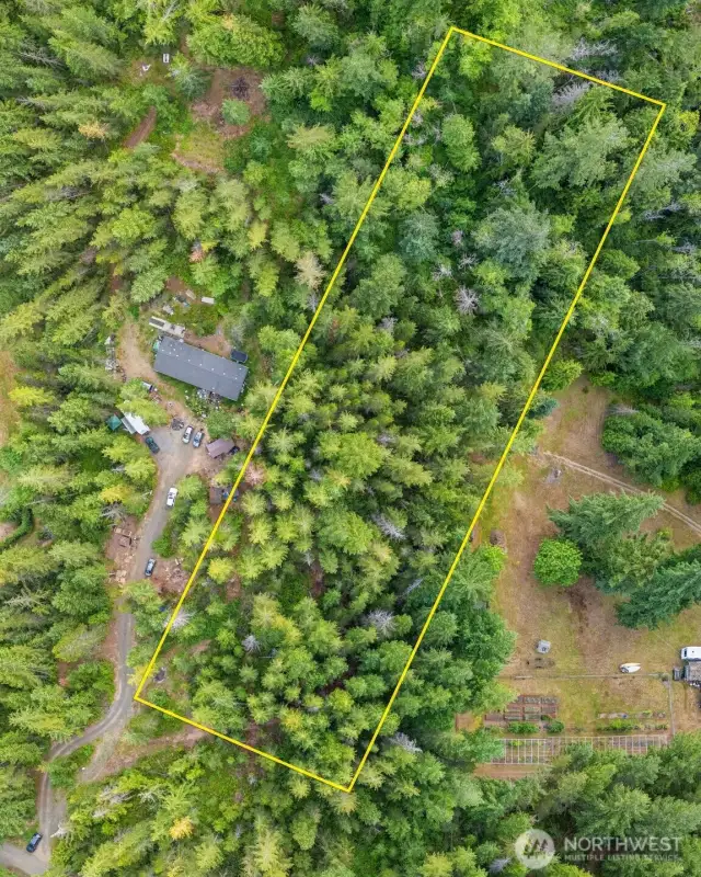Tucked away in a peaceful setting, this desirable 2.64-acre lot offers a great mix of privacy and convenience. Outstanding opportunity to build your dream home with much of the prep work already done! Outdoor lovers will enjoy easy access to numerous nearby lakes and a variety of trails for hiking, motorbiking, and year-round recreation. Property includes an approved gravity septic design for four bedrooms, a shared well agreement in place, and electrical vault nearby. Don’t miss this rare chance to build your self sustaining stand alone home, partially improved property ready for your vision