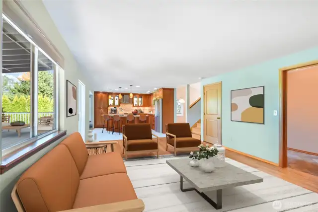 Family room is open to the kitchen and has lots of light.