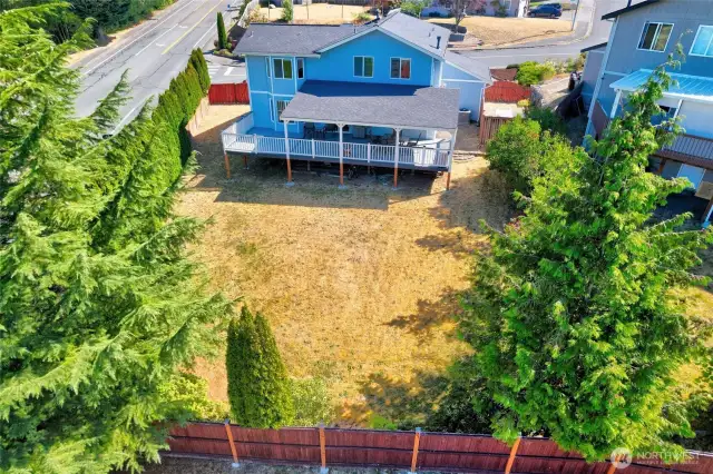 The mature landscaping creates privacy.