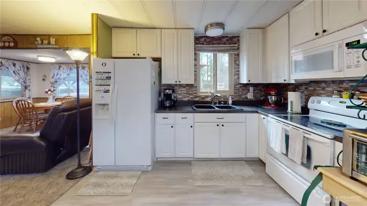 Additional view of the kitchen.