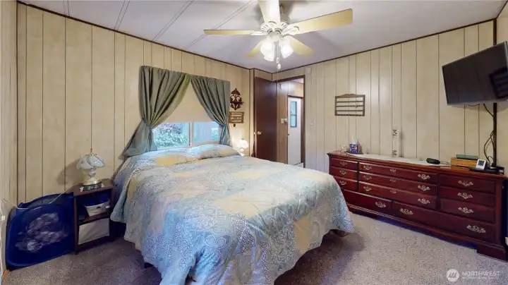 Primary suite features a built-in's, large closet and has easy access to the main bathroon.