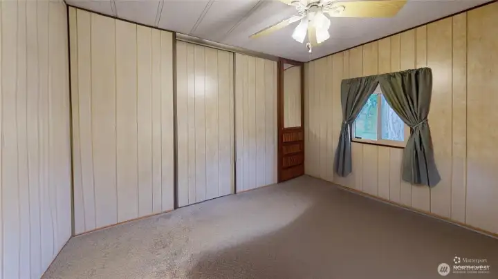 View of the primary suite without furniture.