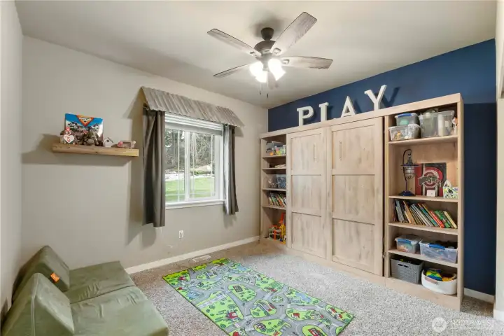 Bedroom #3 with a MURPHY BED! Check out the custom window covering.