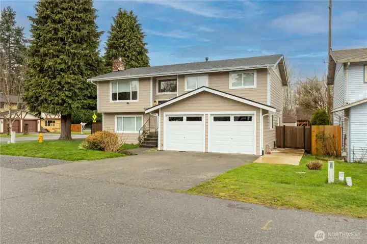 View of front of home showing corner lot.