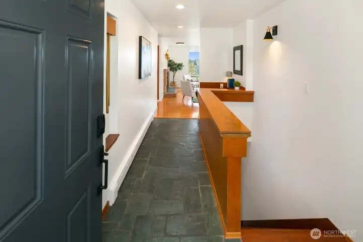 Upon entry, the home is immediately filled with natural light.