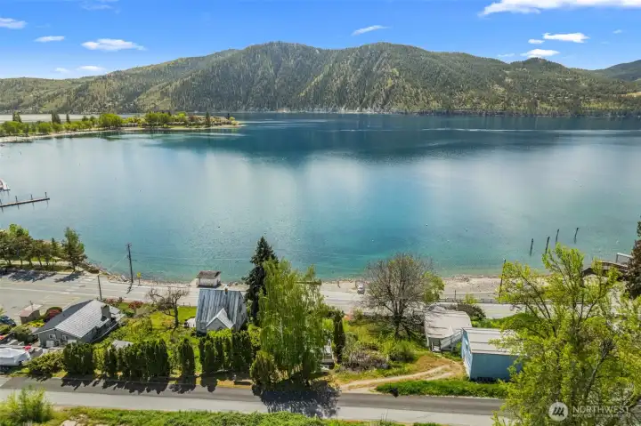 Manson Bay, framed by Wapato Point, showcasing sweeping territorial views.
