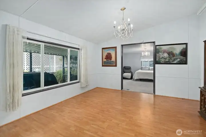 Dining room with entrance to primary bedroom suite